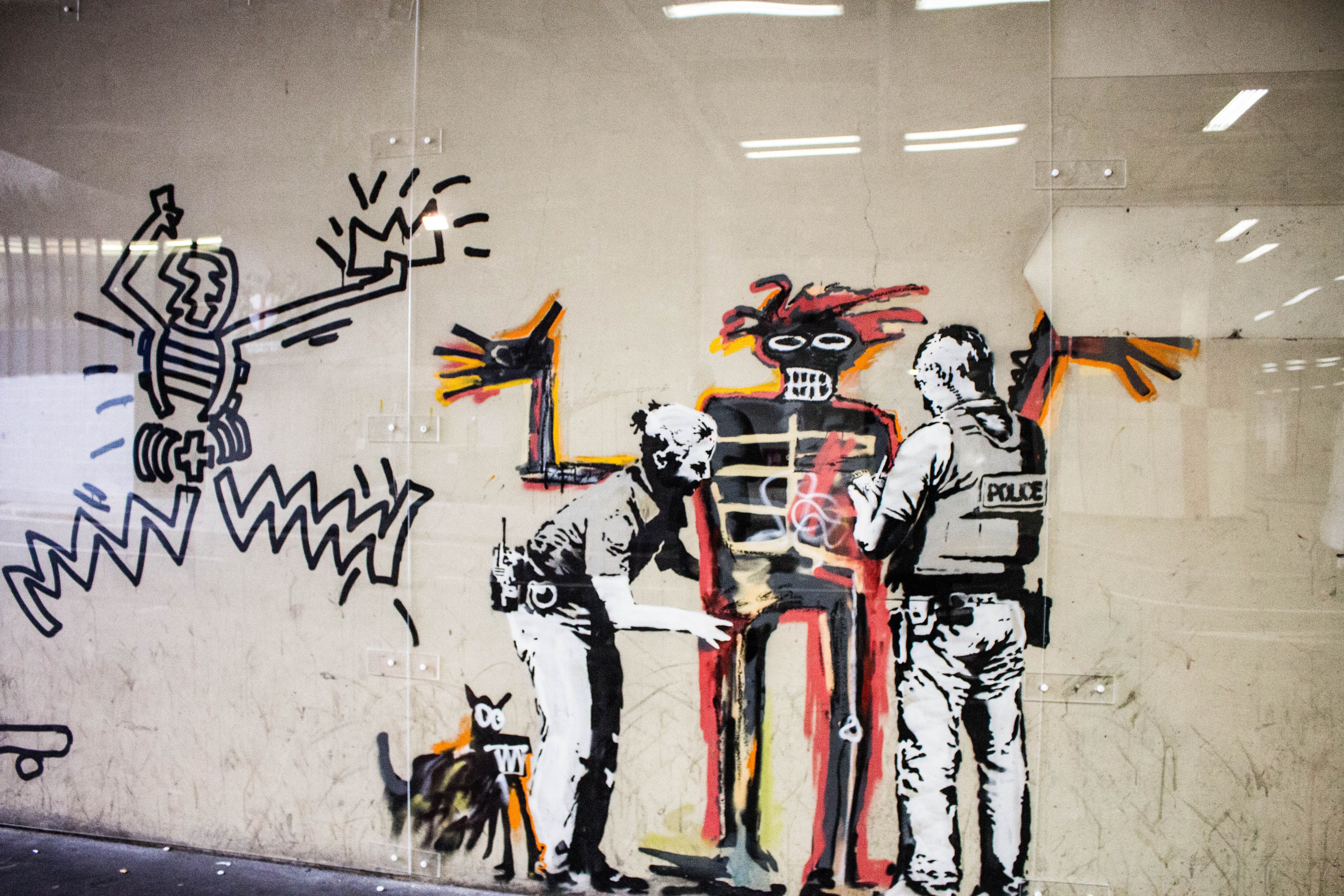 Grafitti de Banksy en el centro de Londres. Foto: Charisse Kenion