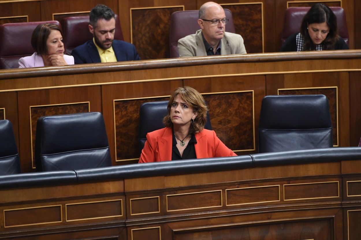 La ministra de Justicia, Dolores Delgado, en su escaño hoy, durante el pleno del Congreso de los Diputados