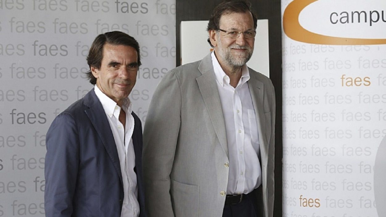 José María Aznar y Mariano Rajoy en un campus FAES
