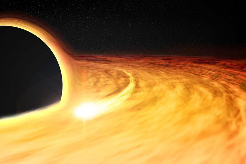 Estrella engullida por un agujero negro. Foto: SINC