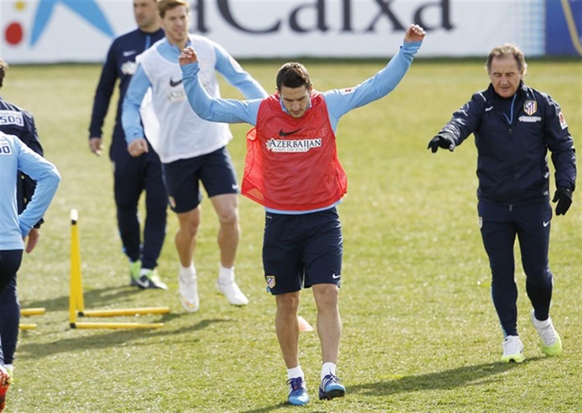 El 'Profe' Ortega, junto a Koke, en un entrenamiento del Atlético de Madrid. Europa Press