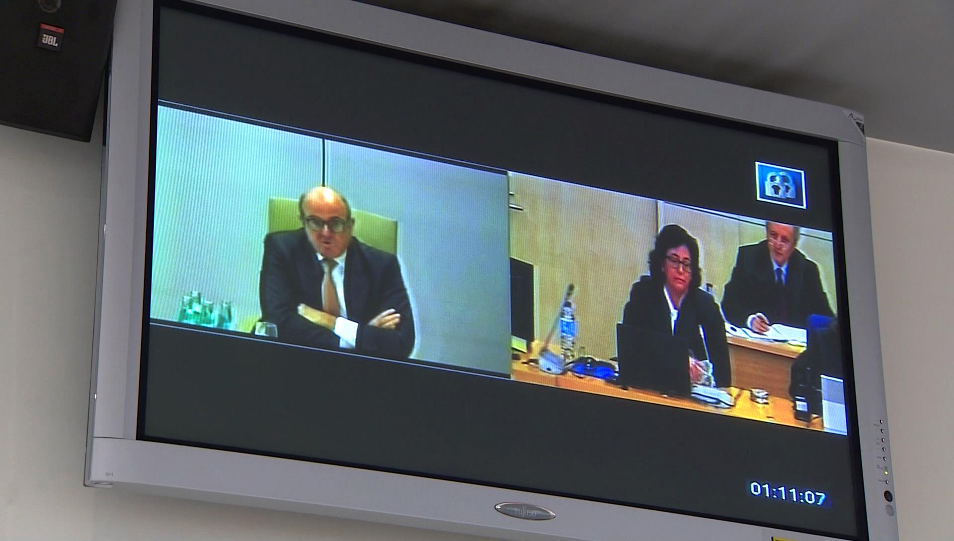 El exministro de Economía Luis de Guindos durante su declaración por videoconferencia en el juicio por la salida a bolsa de Bankia - Europa Press