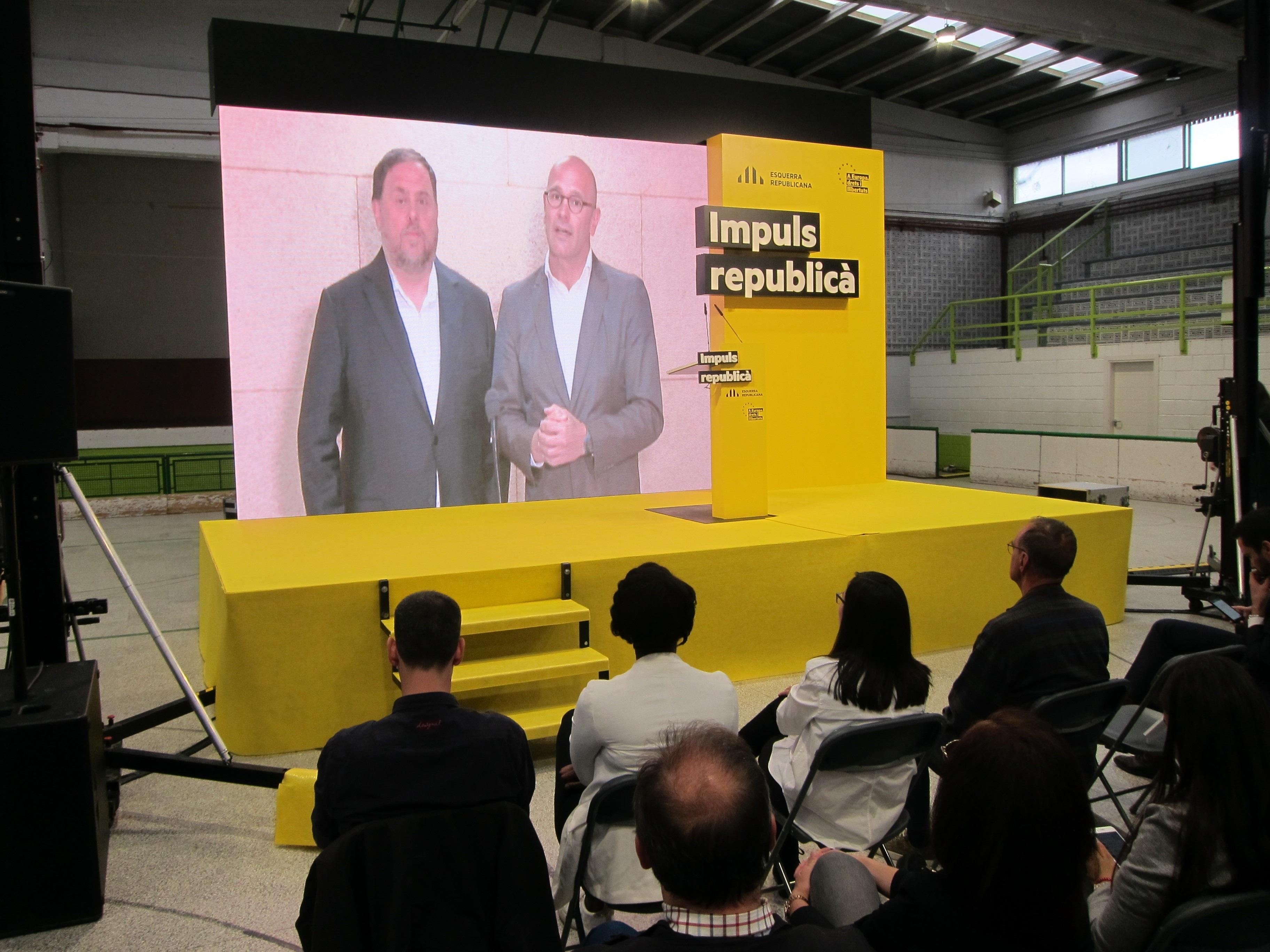 Junqueras y Romeva intervienen en un mitin de ERC a través de un vídeo desde la cárcel. Europa Press.