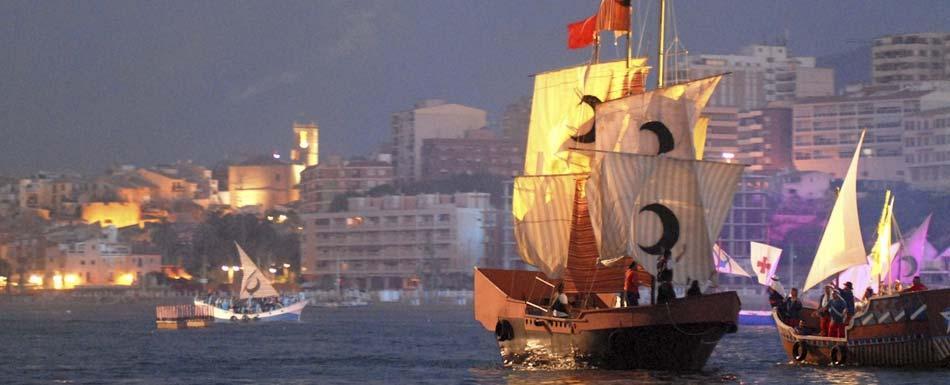 Desembarco en Villajoyosa durante la fiesta de Moros y Cristianos. Fuente Turismo Desembarco en Villajoyosa durante la fiesta de Moros y Cristianos. Fuente Turismo