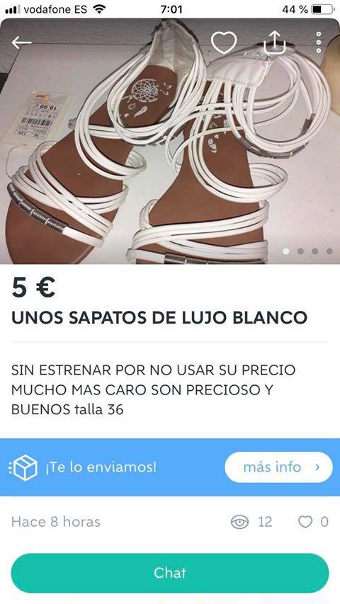 Unos sapatos de lujo blanco