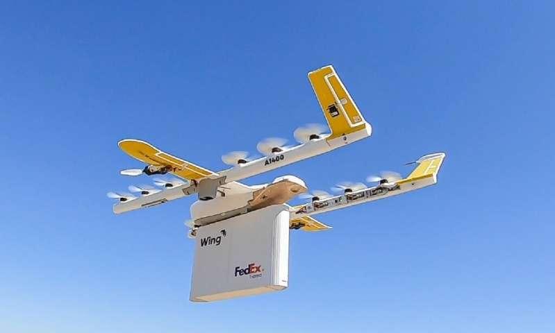 Dron de Google entregando un paquete de FeDex