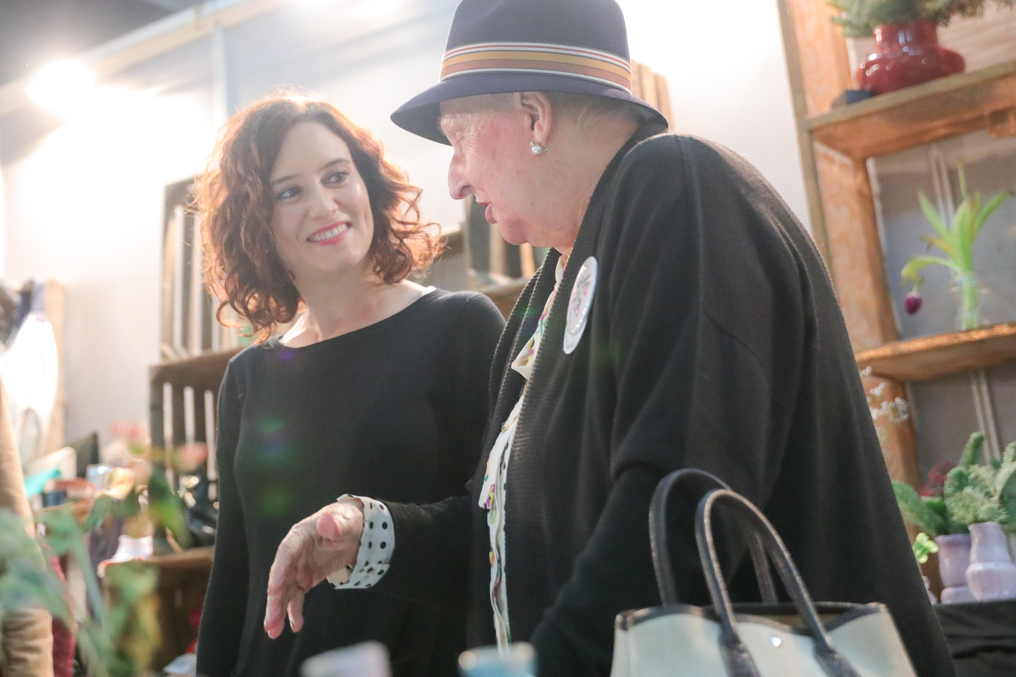 La presidenta de la Comunidad de Madrid Isabel Díaz Ayuso y la Infanta Doña Pilar en el Rastrillo Nuevo Futuro en Madrid a 23 de noviembre de 2019