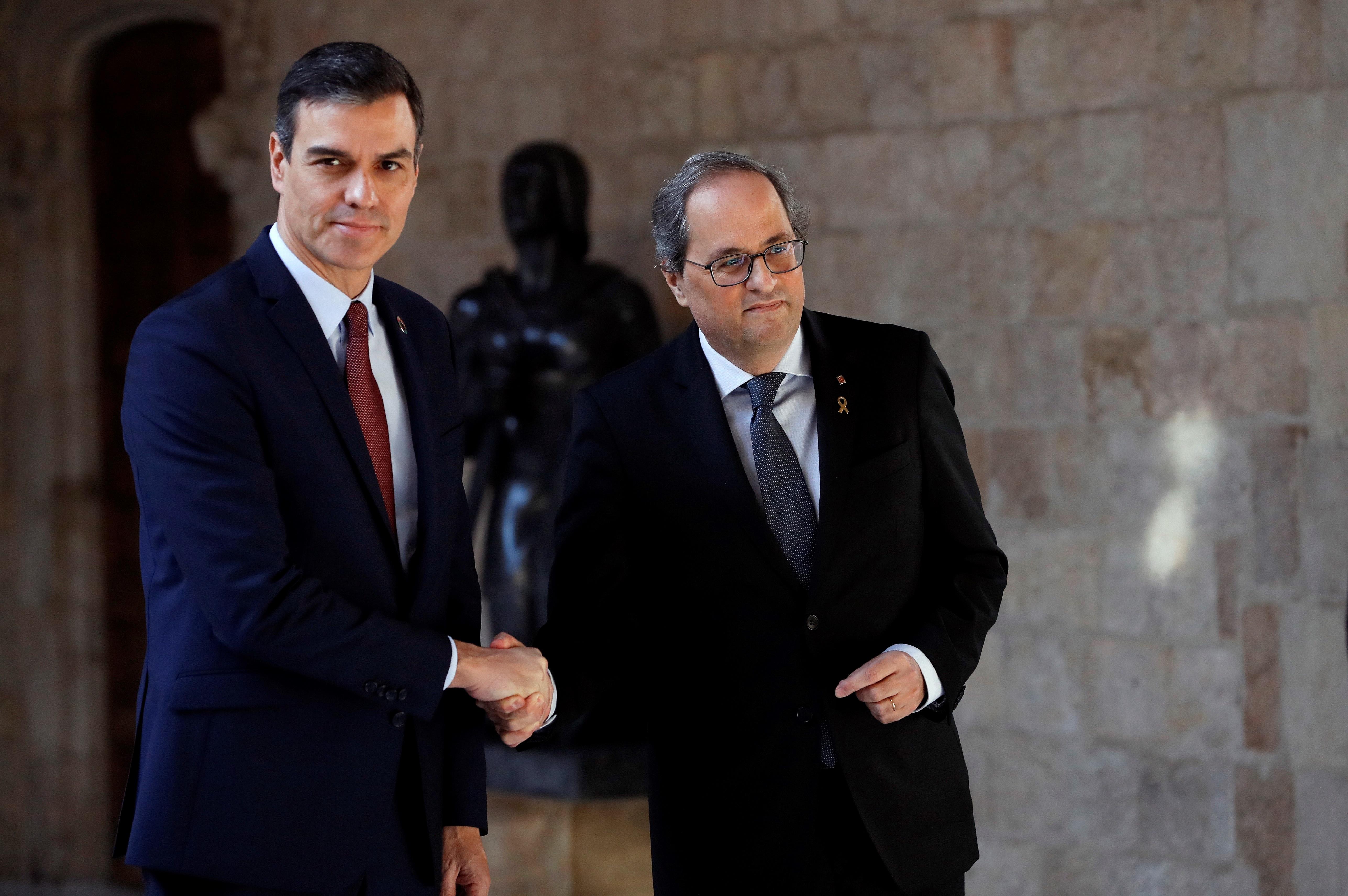  El presidente de la Generalitat Quim Torra (dech) y presidente del Gobierno Pedro Sánchez (izq) 