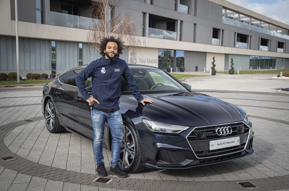 Marcelo recogiendo su Audi A7 que le regala la marca / Real Madrid