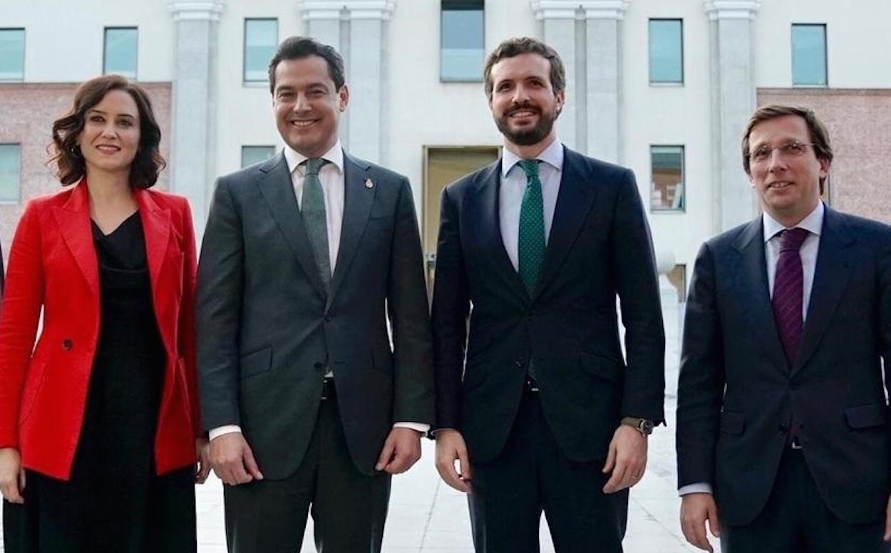 Isabel Díaz Ayuso, Juanma Moreno, Pablo Casado y José Luis Martínez-Almeida, ayer en Madrid.