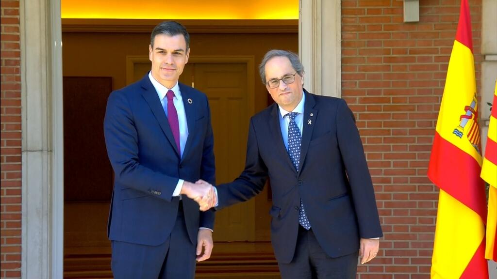 Quim Torra y Pedro Sánchez, munutos antes del arranque de la mesa de negociación