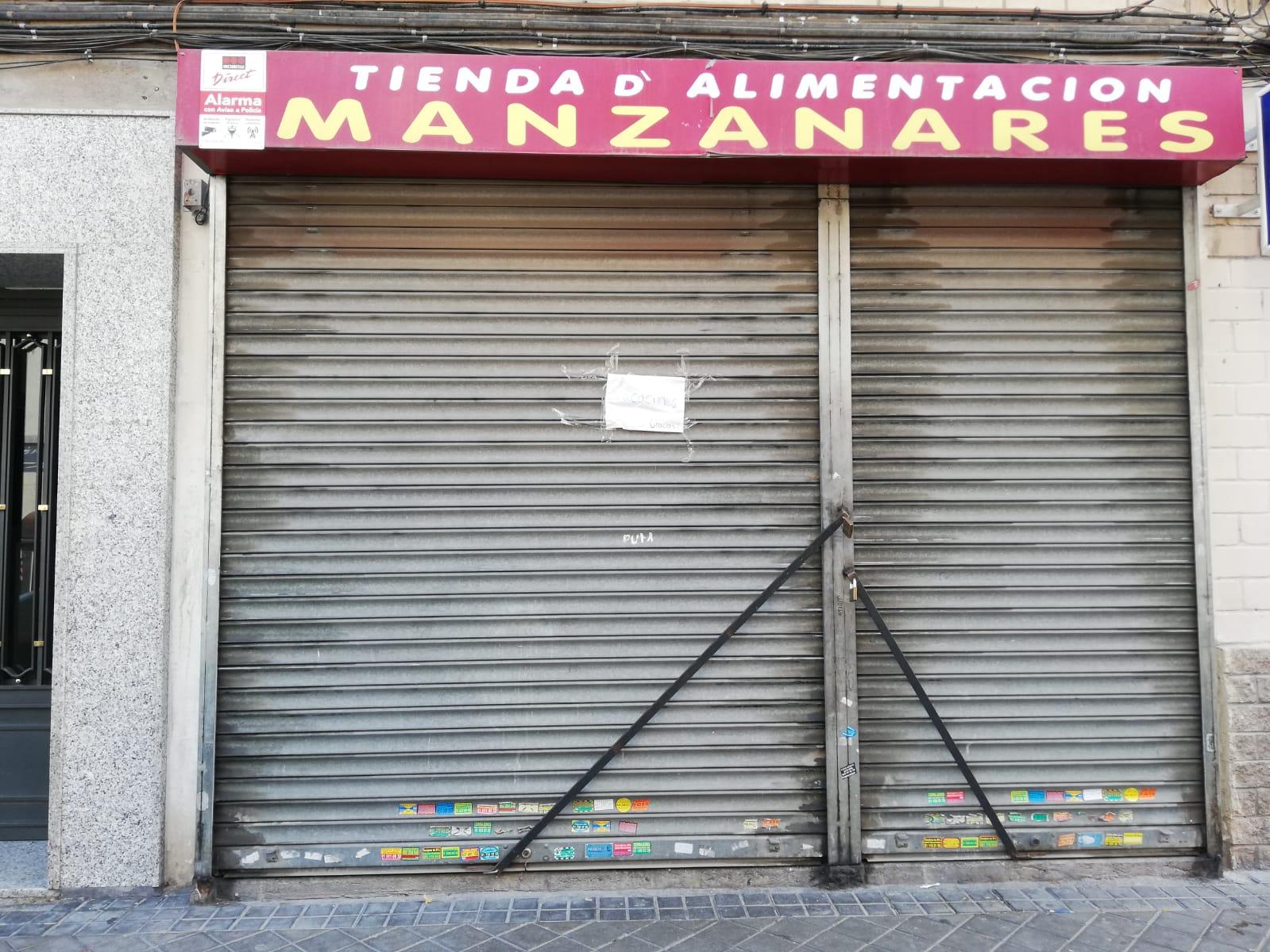 Imagen de una tienda de alimentación cerrada