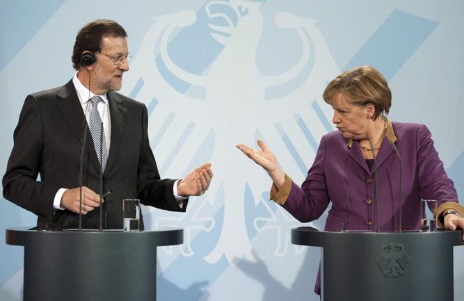 Mariano Rajoy y Angela Merkel durante una rueda de prensa en Berlín.