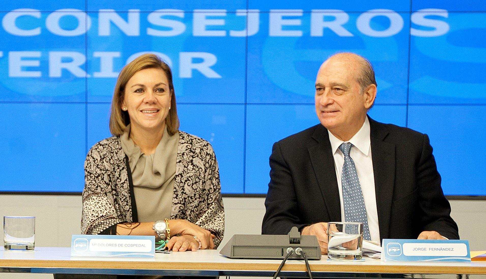 María Dolores de Cospedal y Jorge Fernández Díaz en un acto del PP. Fuente: Europa Press.