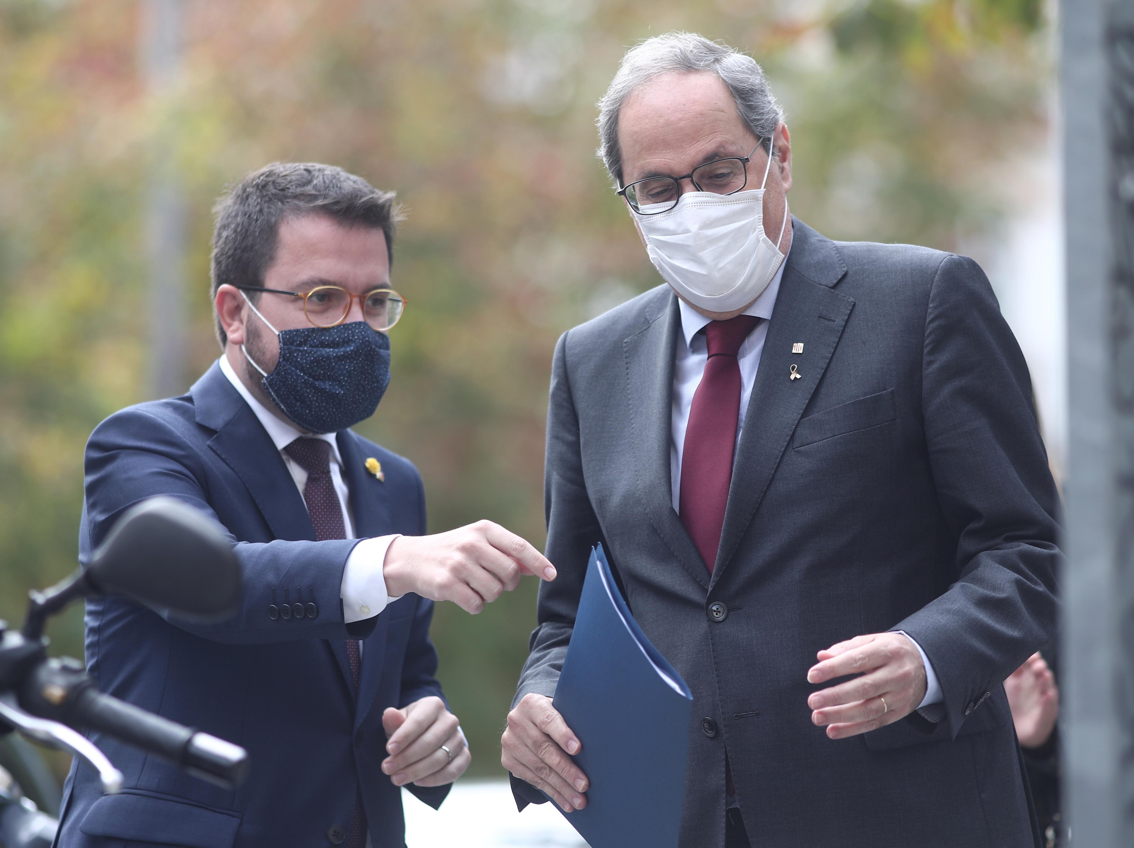 Pere Aragonés junto al expresident Quim Torra. EP